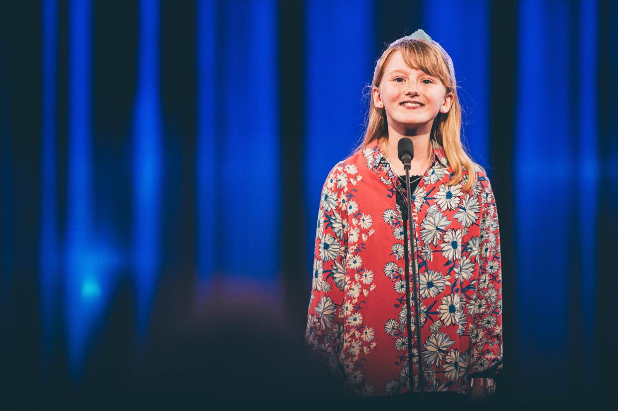 Child reciting on Pavilion stage