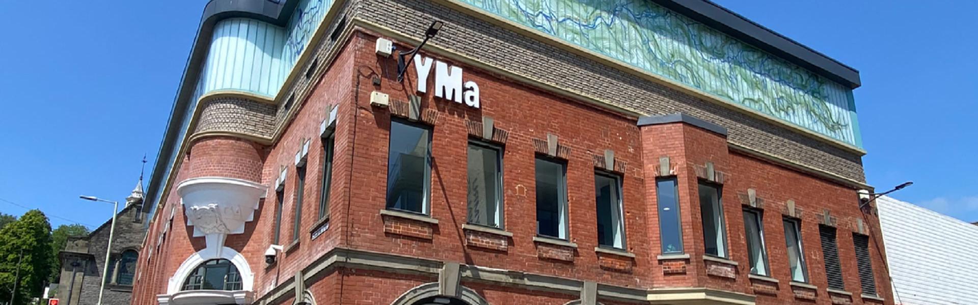 YMa, an arts centre in the former YMCA building in Pontypridd, under a blue sky