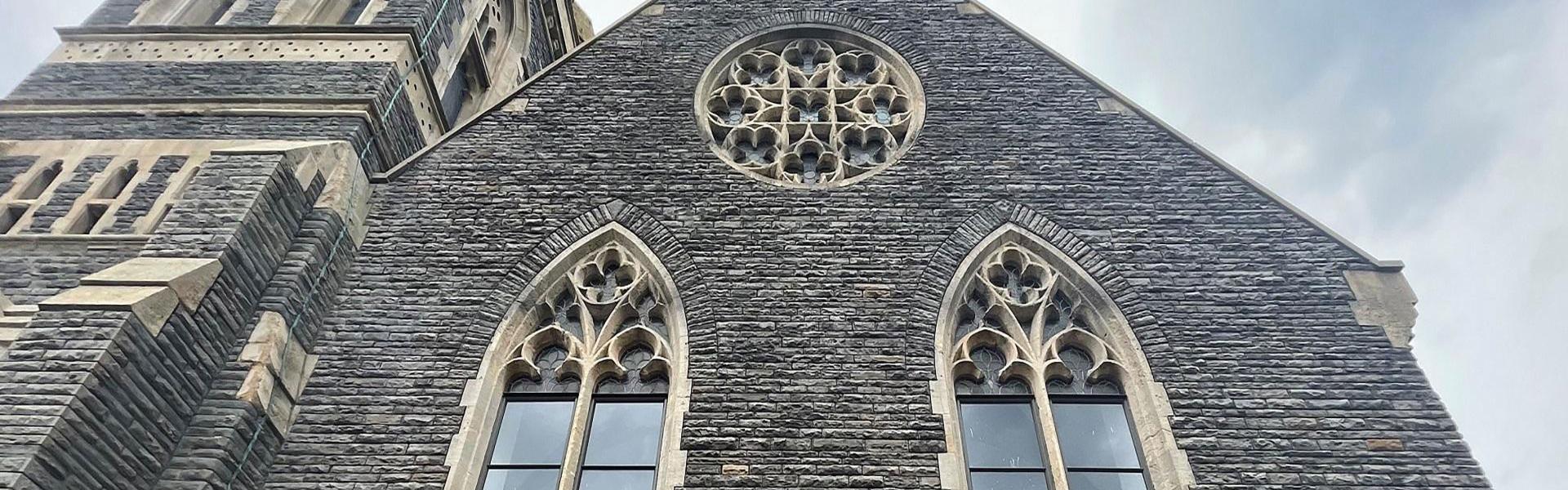 The Muni Building in the centre of Pontypridd.  Picture looking up at the building with a grey sky