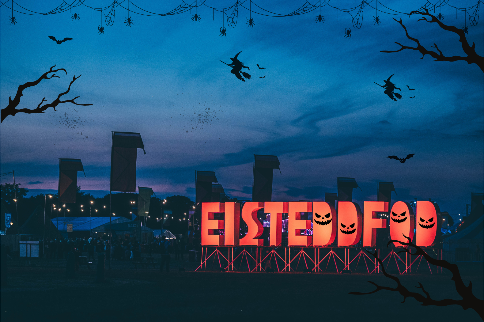 Eisteddfod sign with halloween decorations | Arwydd yr Eisteddfod gyda addurniadau Calan Gaeaf